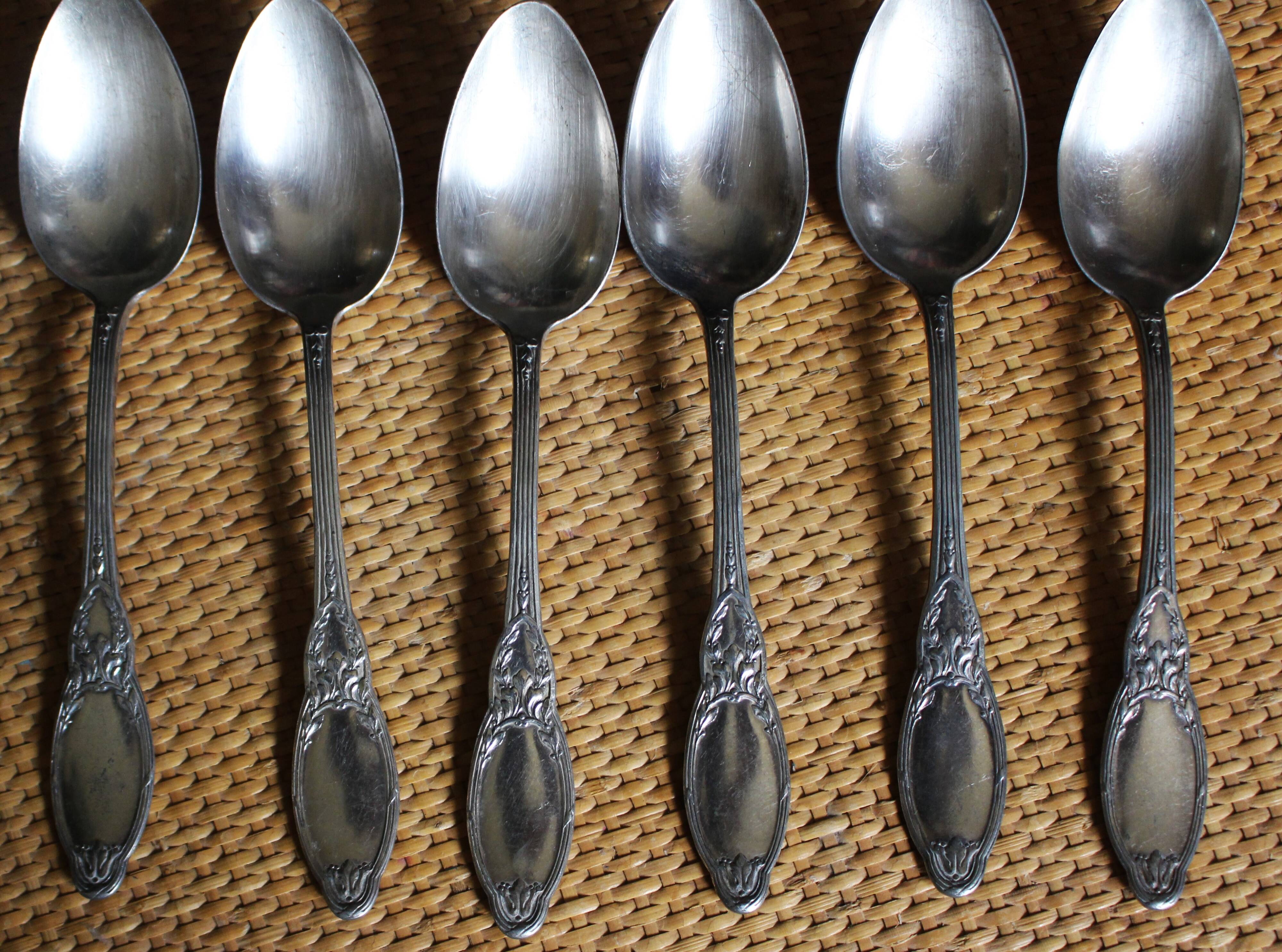 One of 6 silver-plated leafy metal soup spoons