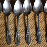 One of 6 silver-plated leafy metal soup spoons