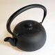 Black cast iron teapot