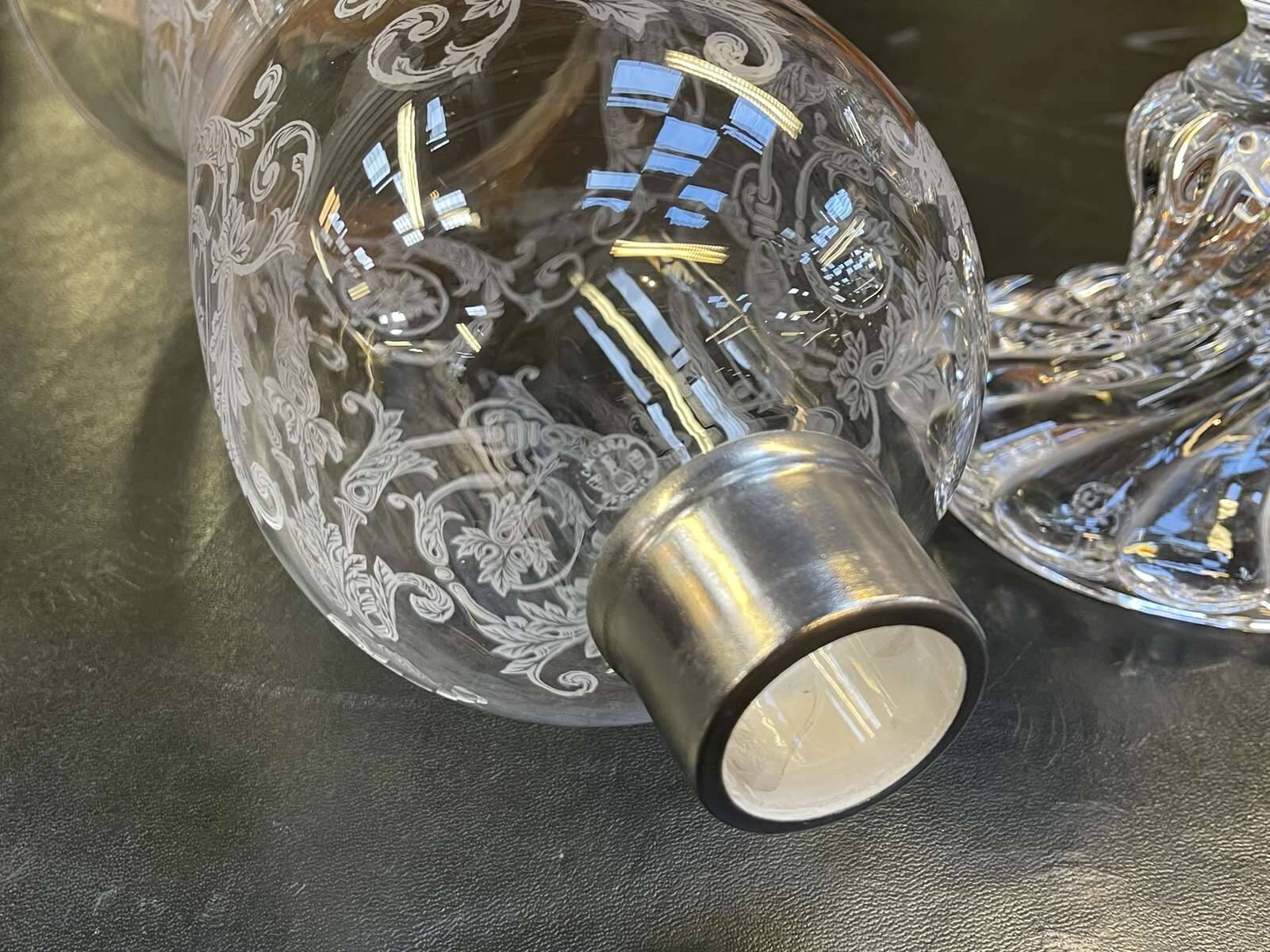 Baccarat crystal lantern with engraved foliage decoration.