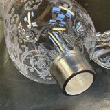 Baccarat crystal lantern with engraved foliage decoration.