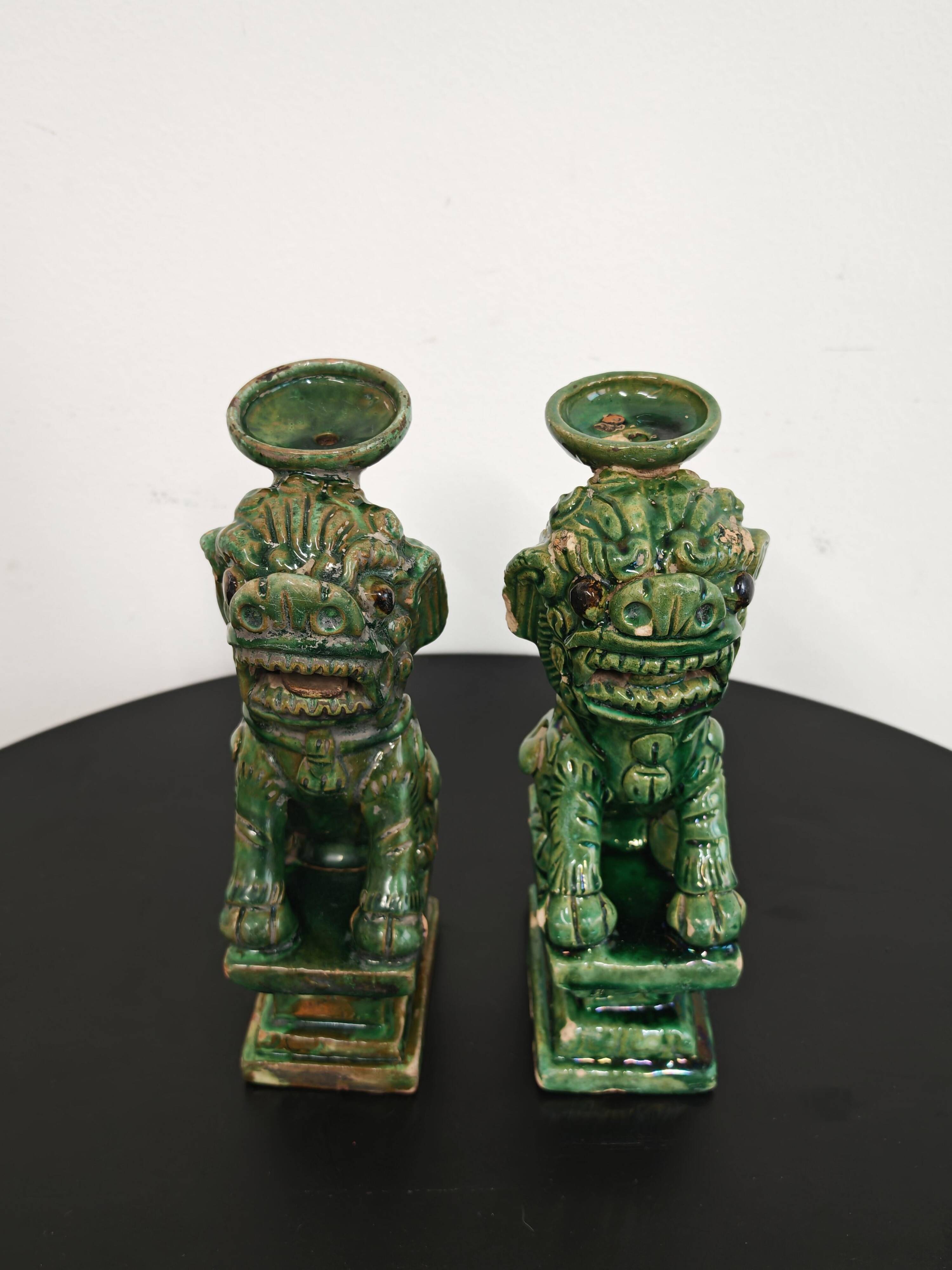 Pair of Foo Dog candle holders in ceramic, China 19th century