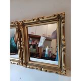 Pair of wood and gilded stucco mirrors