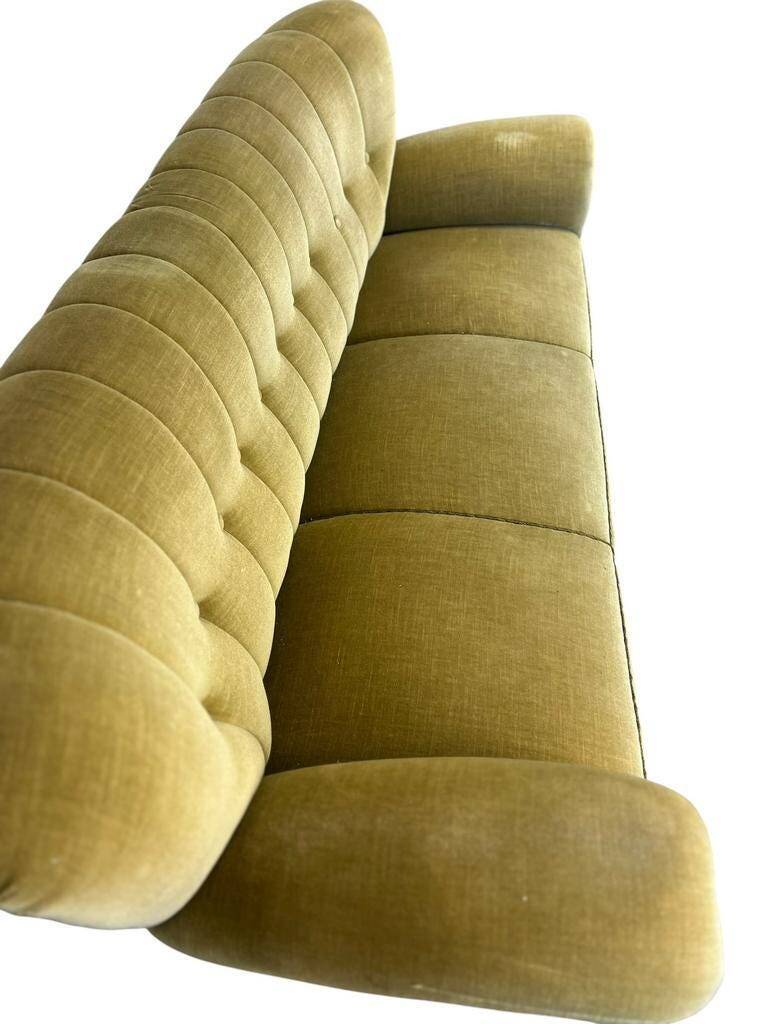 Vintage yellow-green fringed three-seater sofa