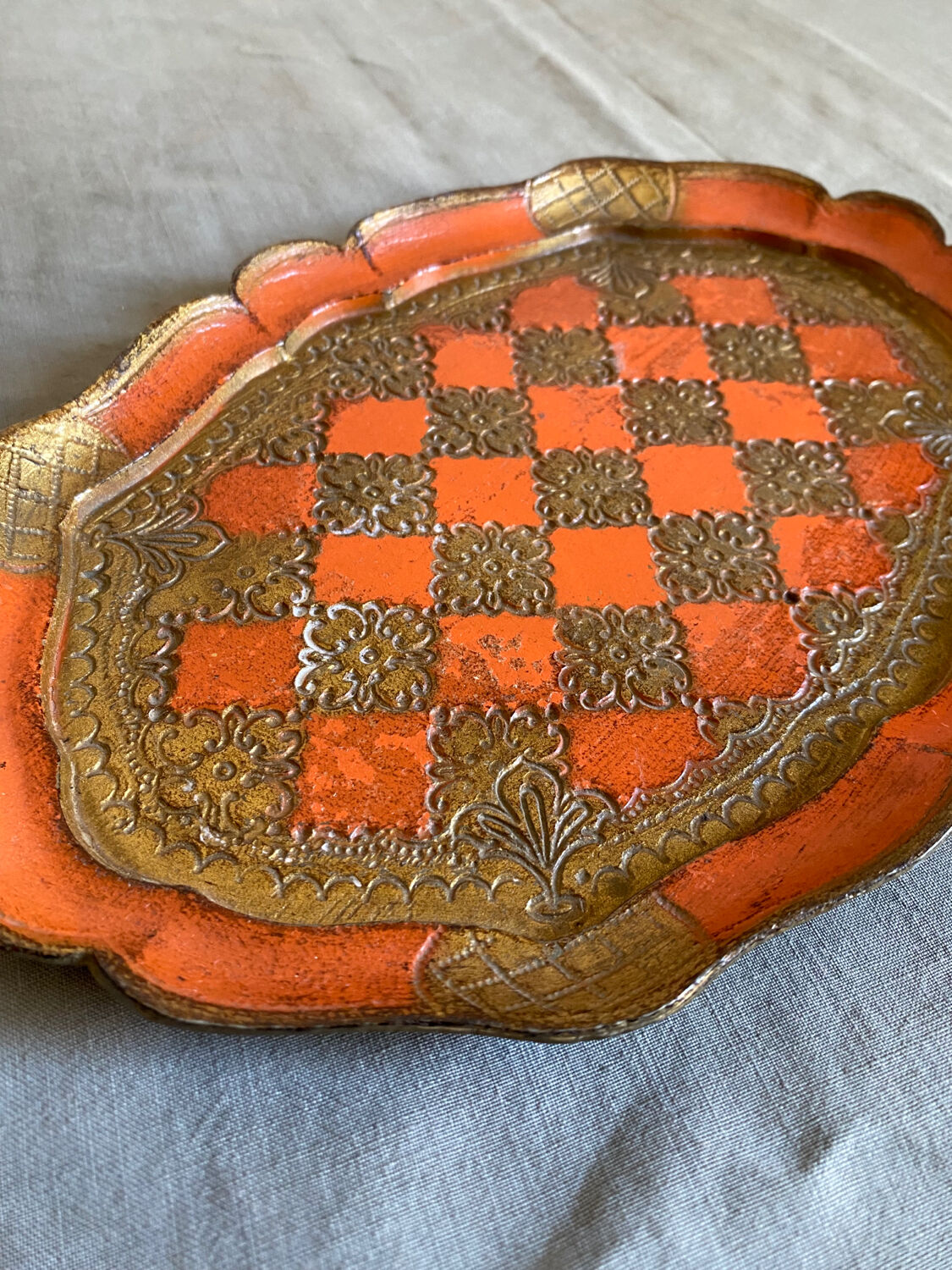 Venetian tray in orange and gold wood