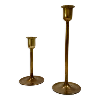 Duo of antique brass candle holders