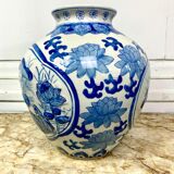 Chinese vase in blue-white porcelain decorated with lotus flowers