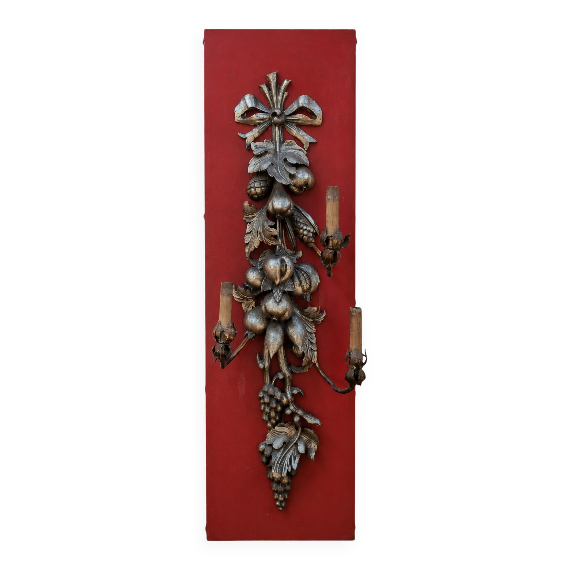 Large three-light wall sconce in silver wood with fruit decoration.