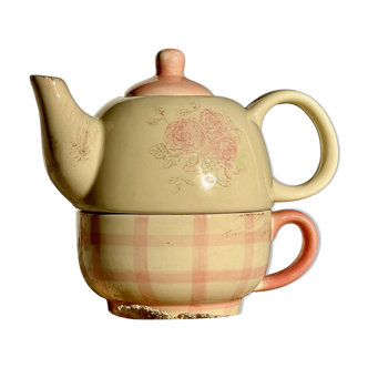 Vintage porcelain teapot and cup set with pink and beige floral and gingham pattern