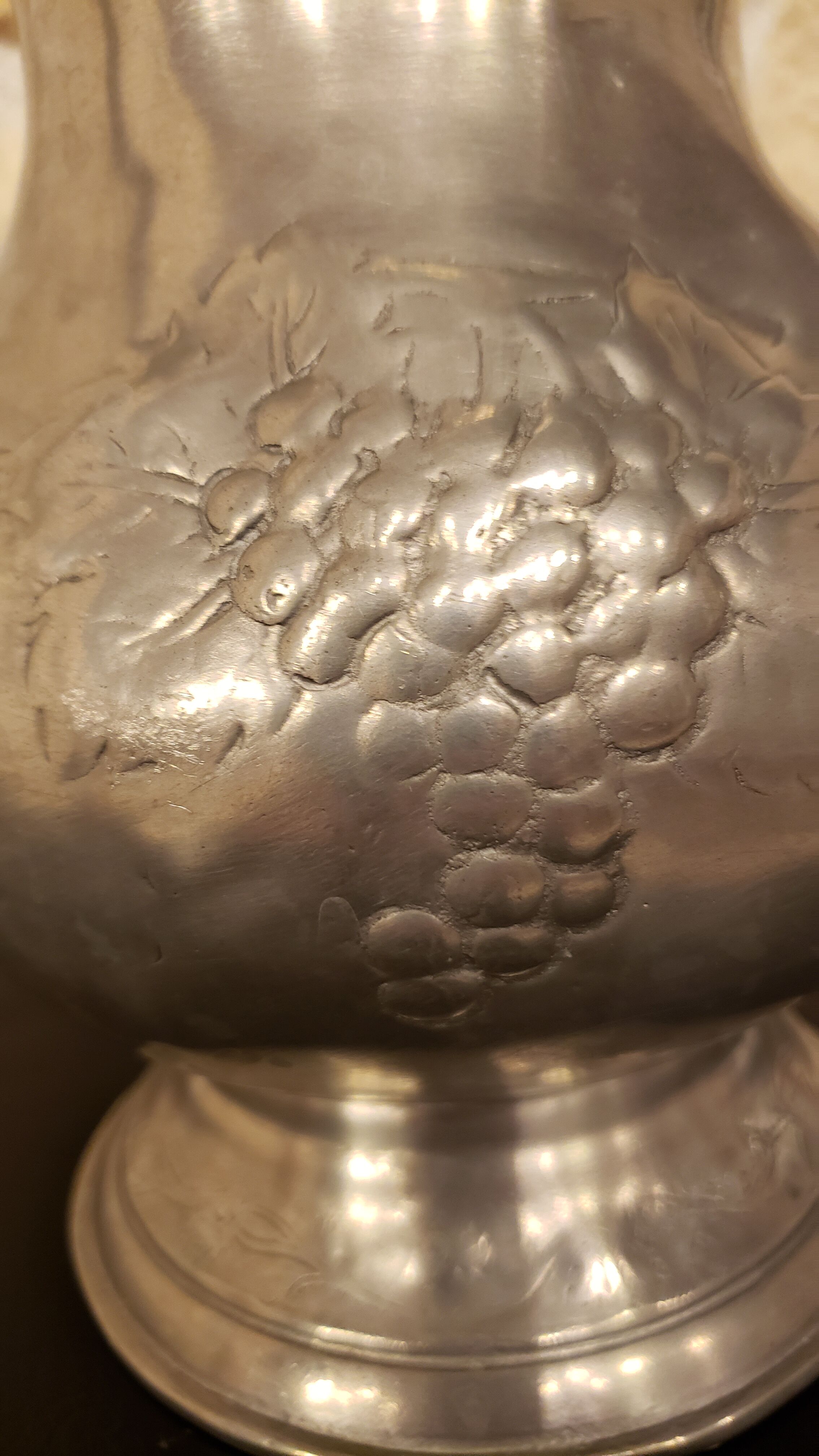 Tin pitcher decoration bunch of grapes