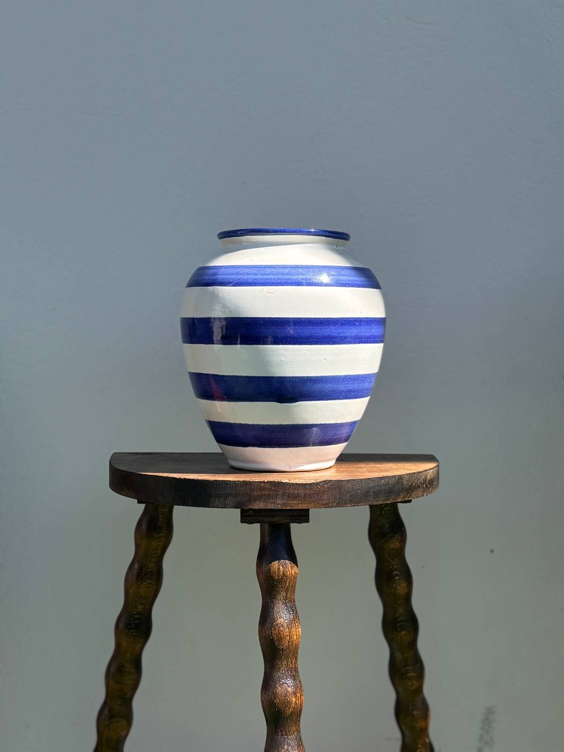 Blue striped ceramic vase