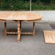 Round extendable farmhouse dining table, stripped, Louis XIII style from the 1960s.