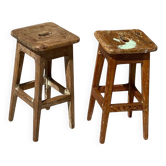Pair of vintage wooden workshop stools with a patina.