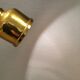 Small golden Danish hanging lamp in metal and brass.