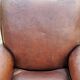 Paire de fauteuils club en cuir brun des années 30