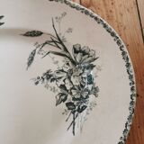 Old oval plate in iron earth