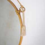 Hanging mirror in gilded brass