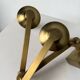 Pair of brass wall lights with articulated arms from the 70s