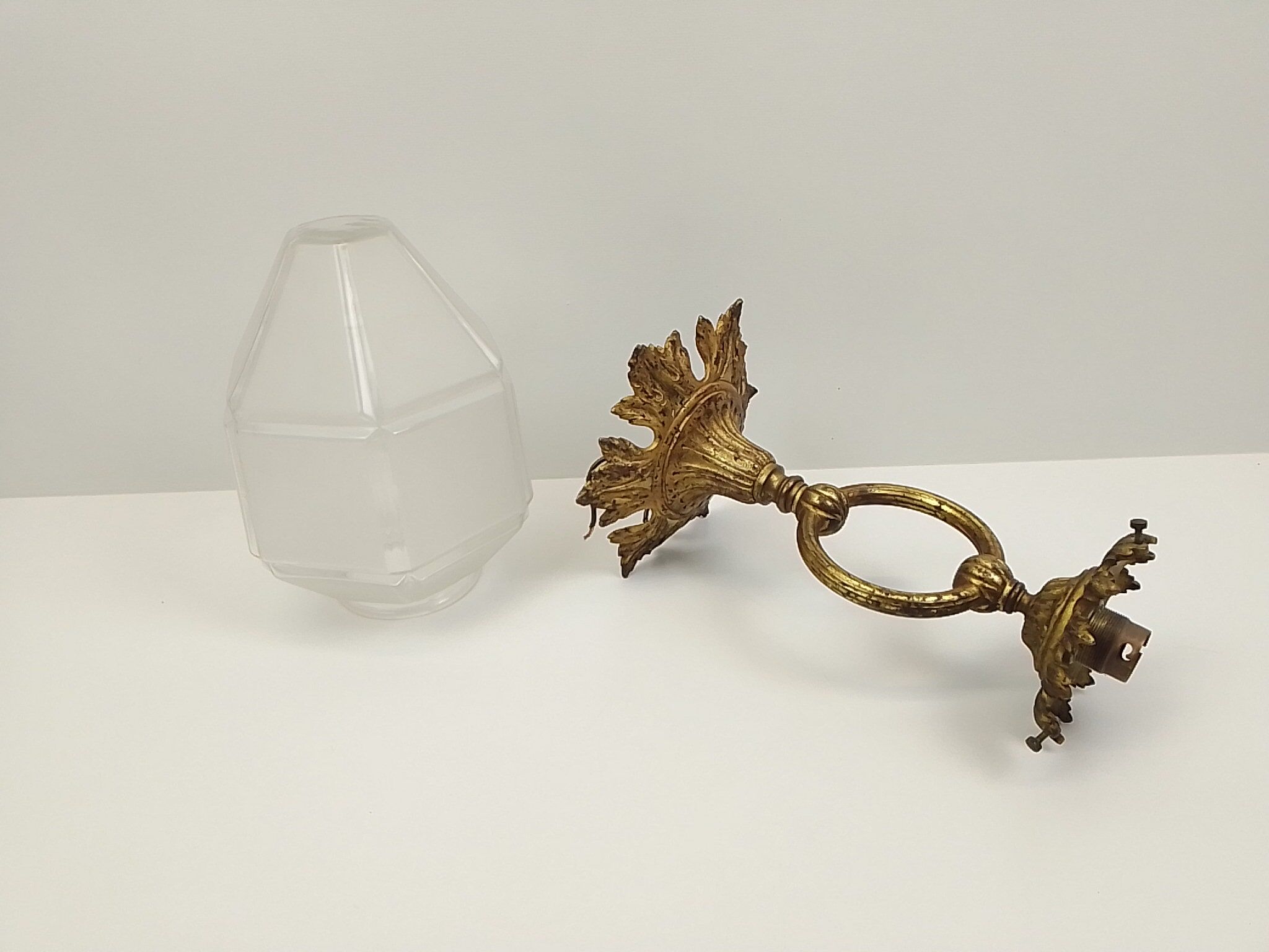 Vintage chandelier in brass and glass