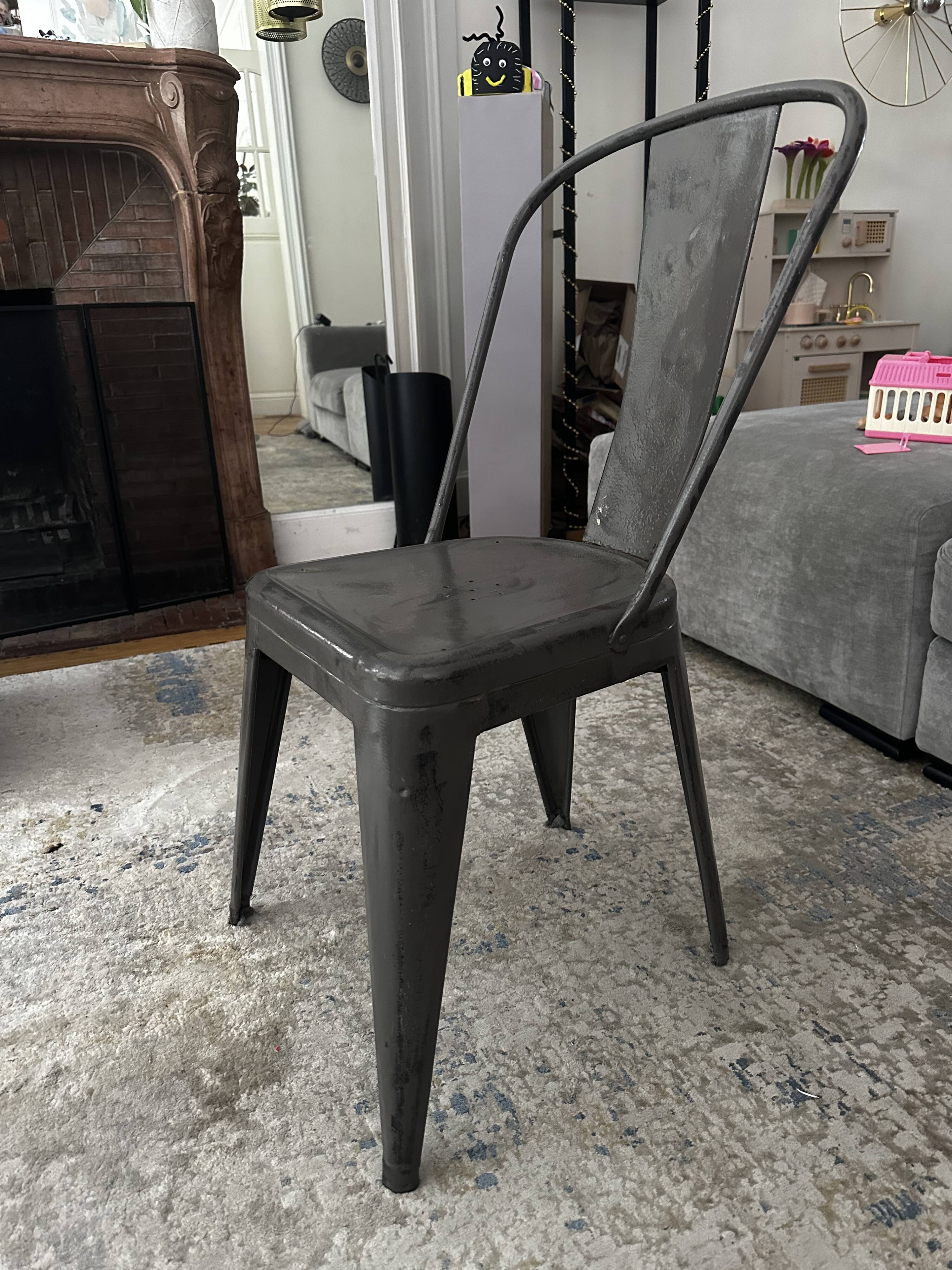Pair of vintage Tolix model A chairs, designed by Xavier Pauchard.