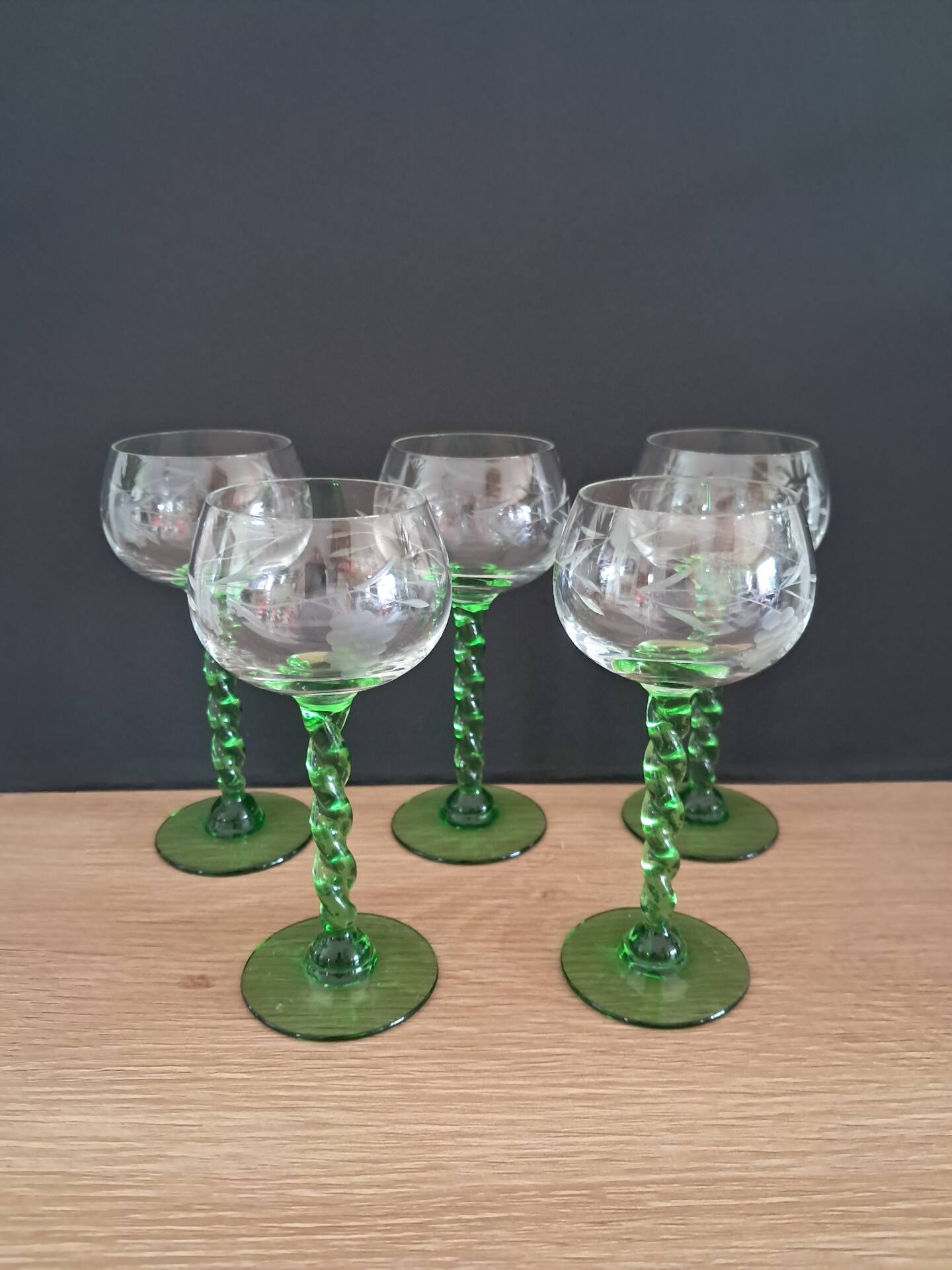 5 white wine glasses with twisted stems