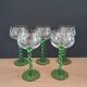 5 white wine glasses with twisted stems
