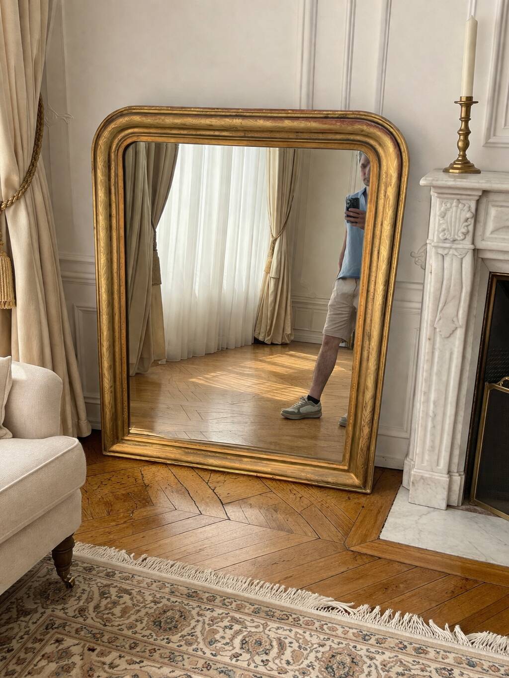 Large Louis-Philippe gilded mirror with gold leaf