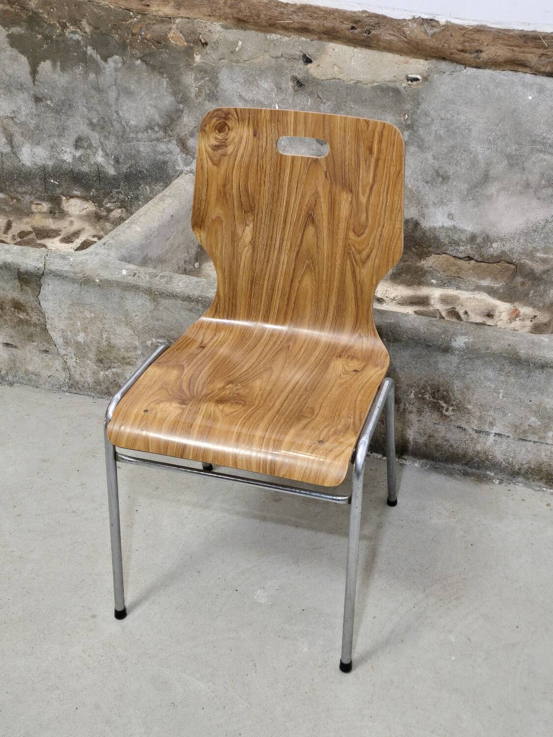 1960s chair in curved plywood on stainless steel base