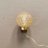 Wall light in rosewood with bobble glass ball shade.