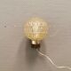 Wall light in rosewood with bobble glass ball shade.