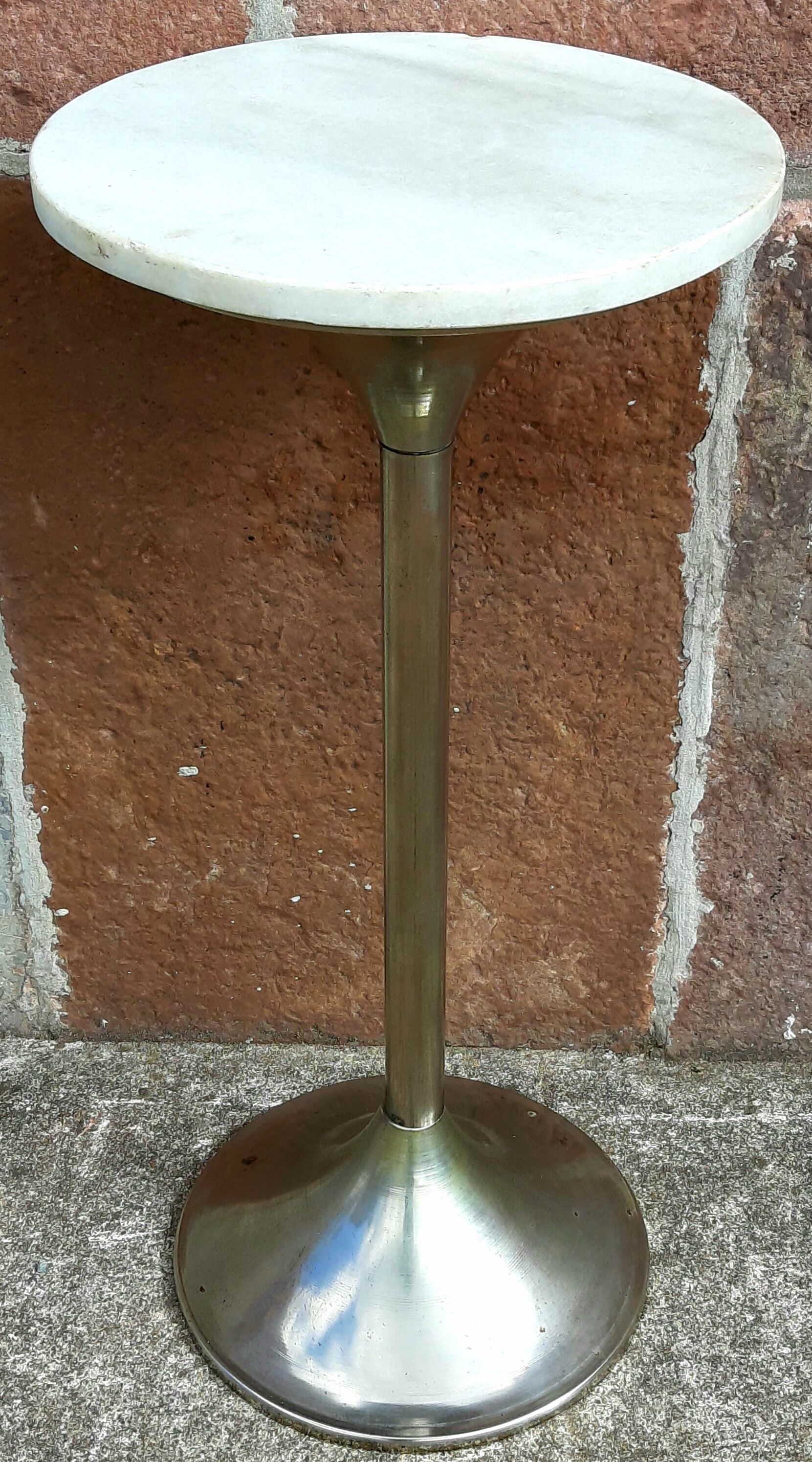 Golden metal selette on marble