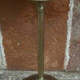 Golden metal selette on marble