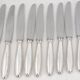 Christofle Rubans, 10 silver-plated table knives, in excellent condition.