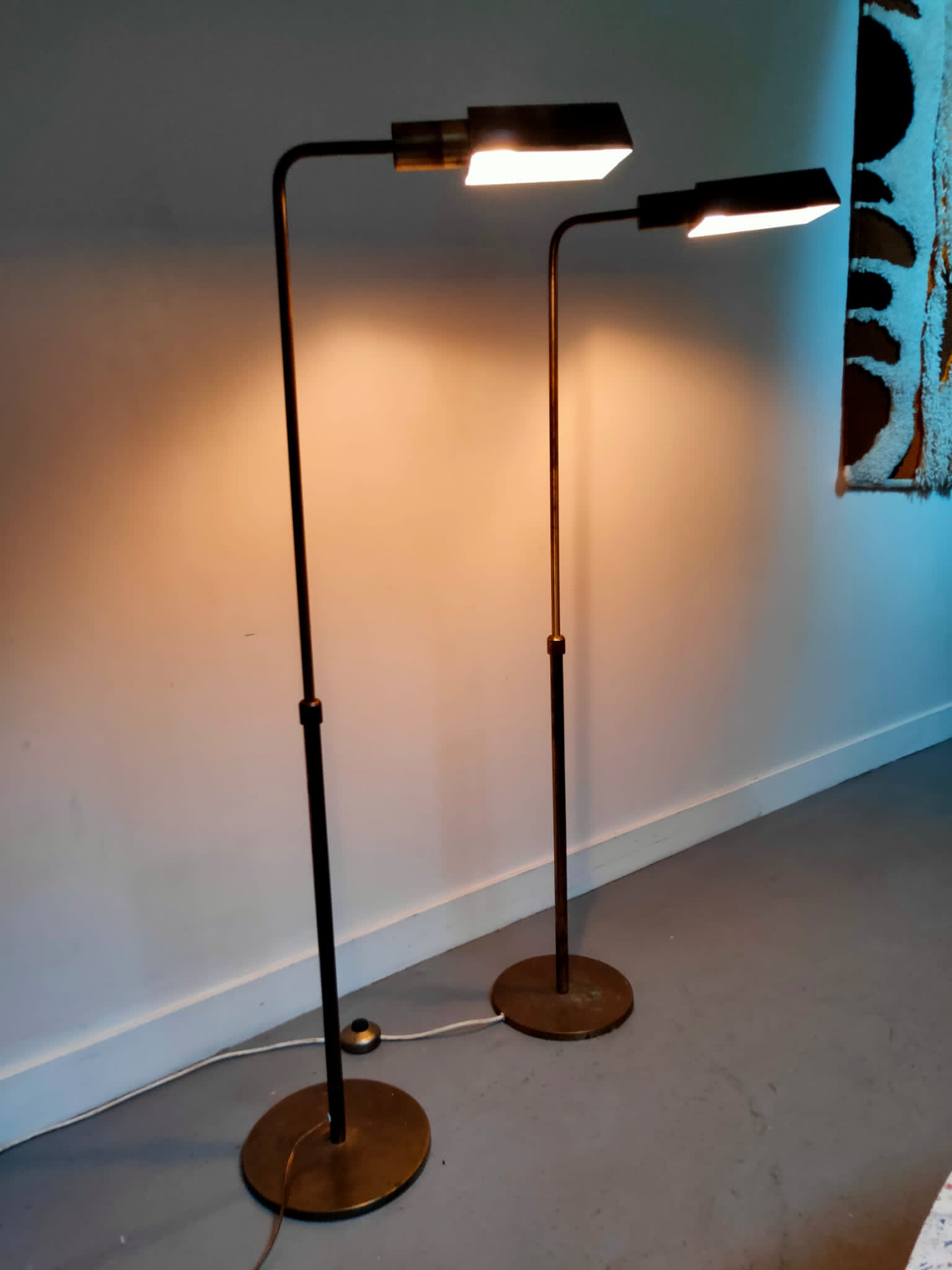 Two vintage brass lampposts