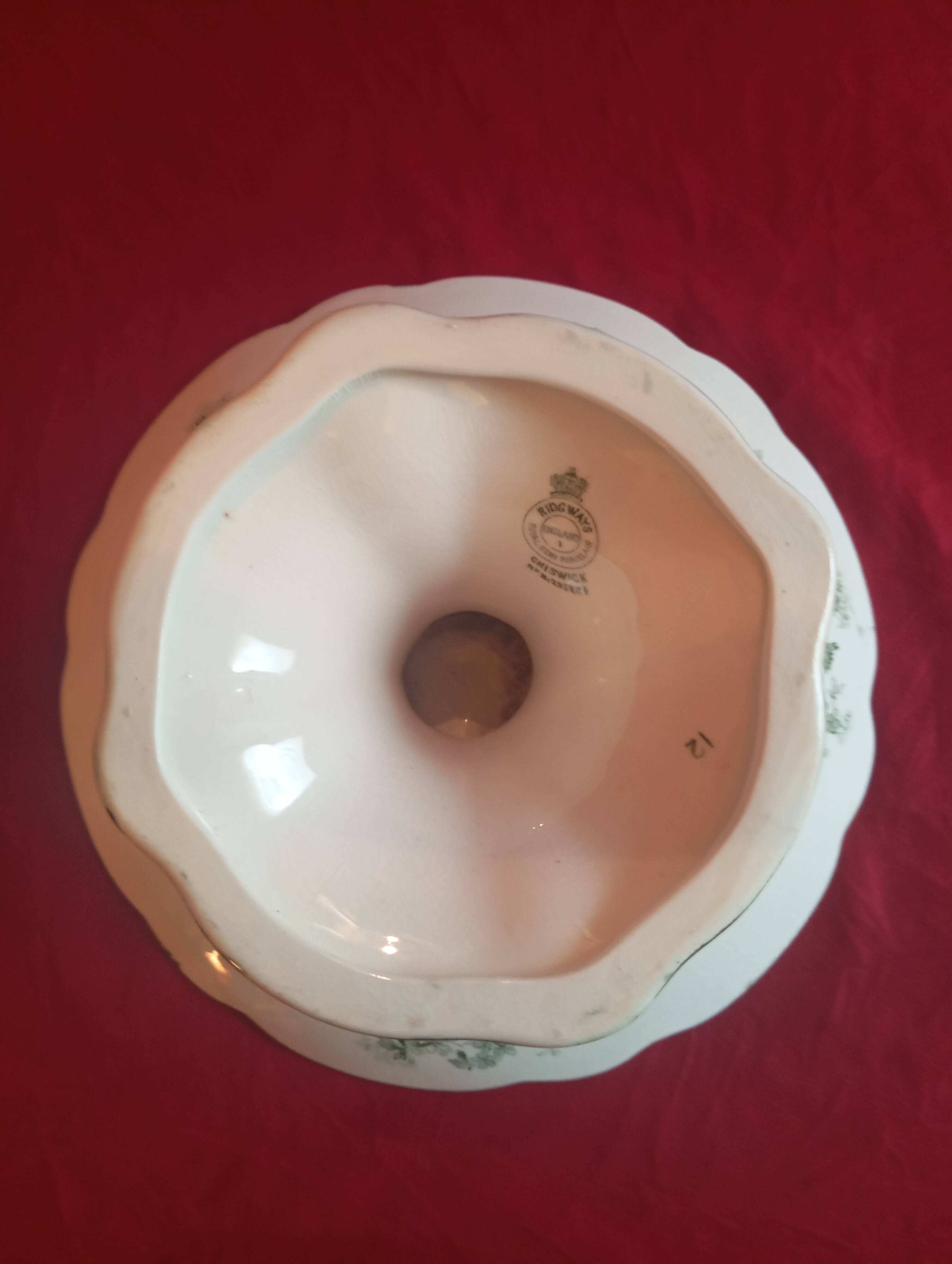 A cake stand on a pedestal in semi-English porcelain "Ridgways".