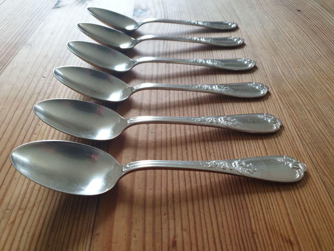 Old silver metal spoons