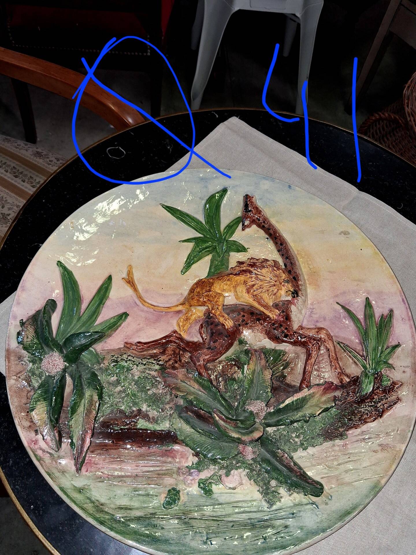 Large wall plate in ceramic with relief decoration