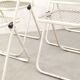 Four Talin Spa metal mesh chairs from the 1980s.