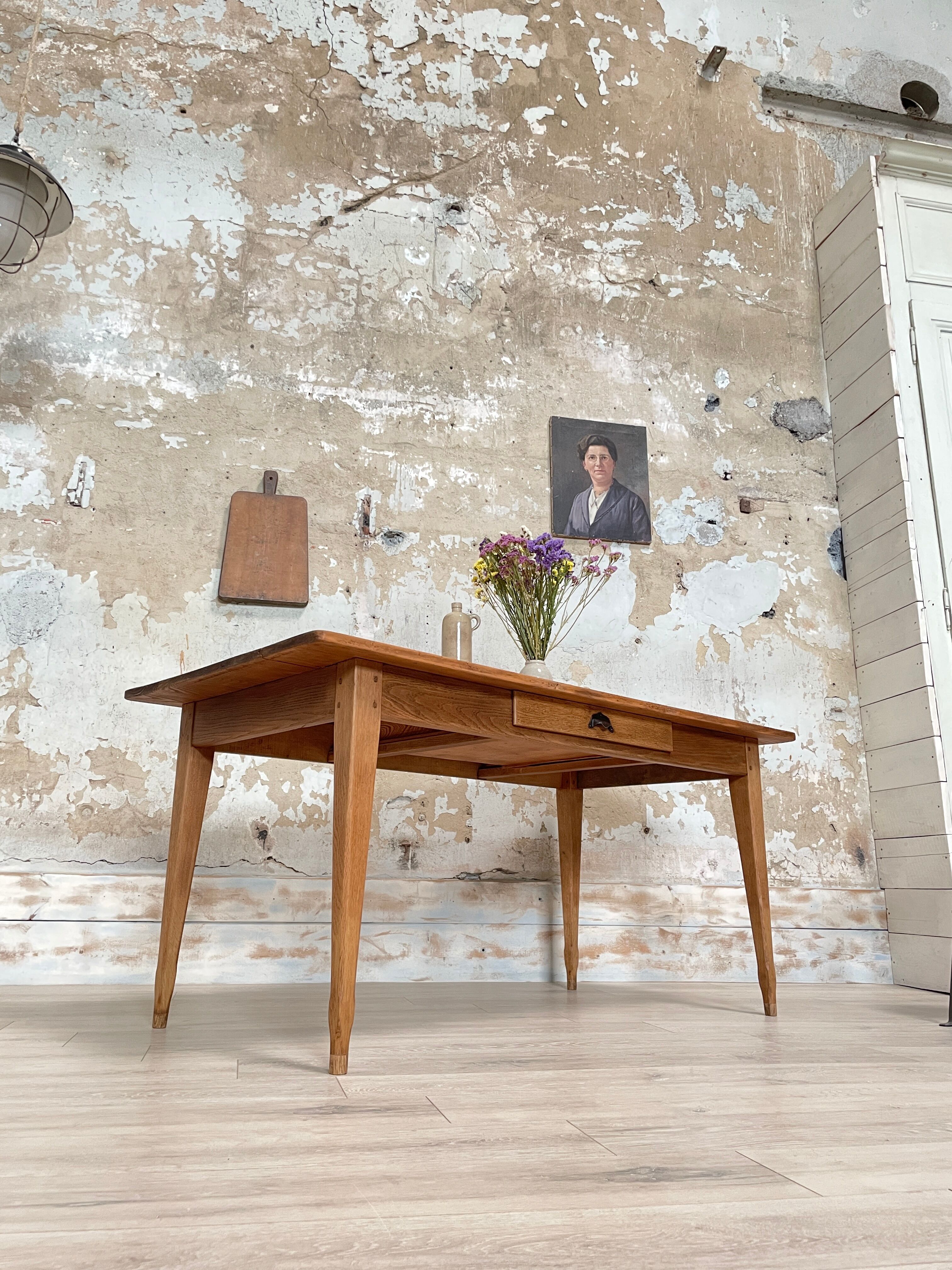 Vintage farmhouse table with spindle legs.