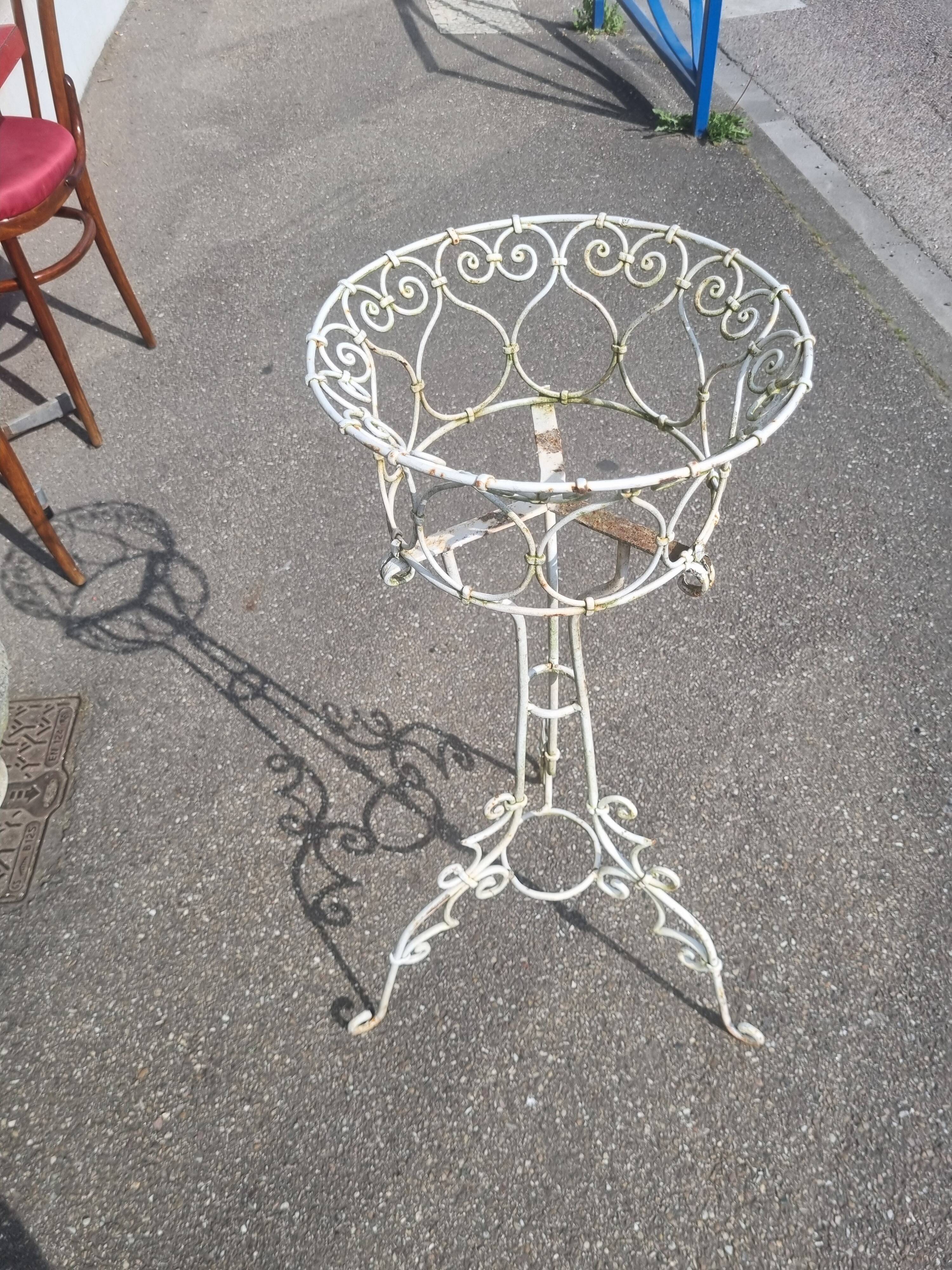 Old wrought iron planter