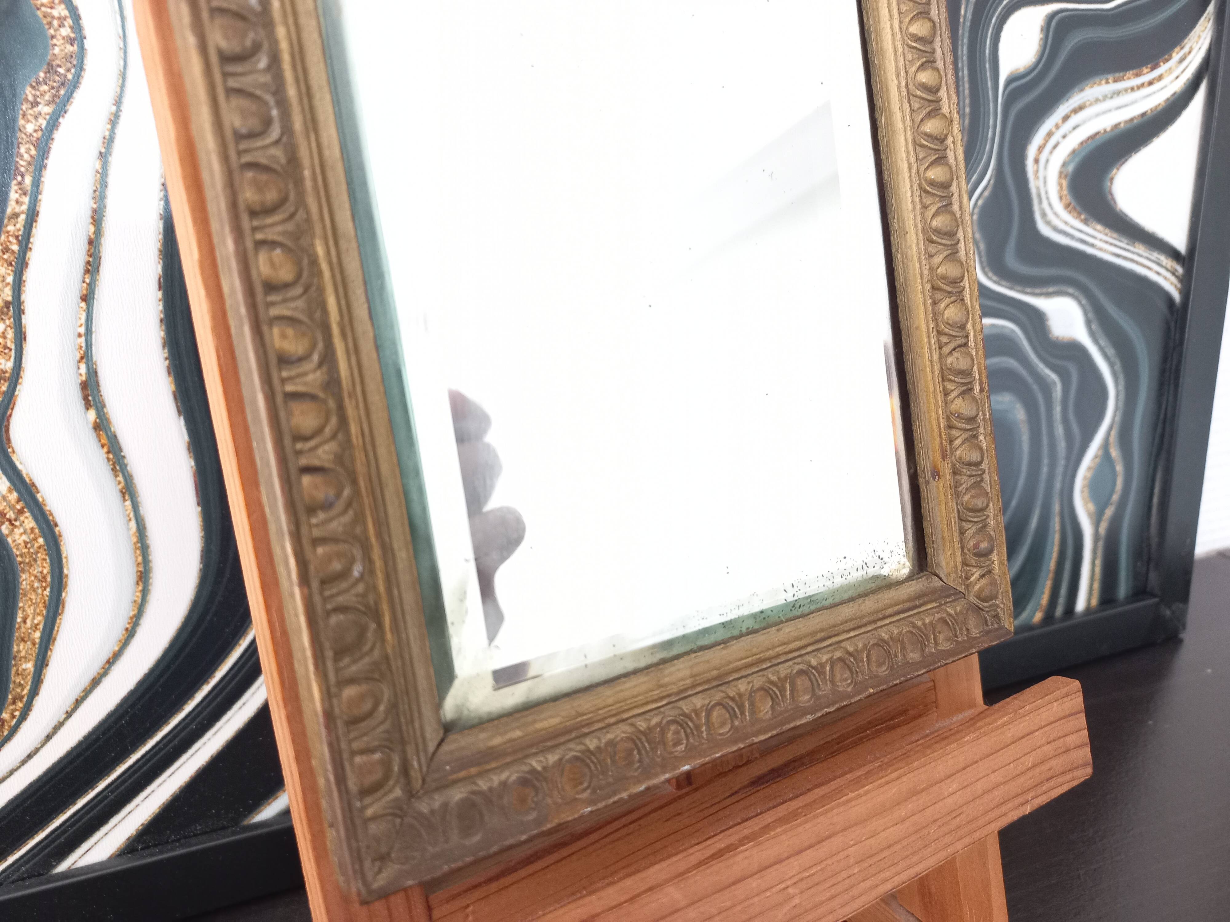 Small vintage mirror in gilded wood, bevelled glass with chain.