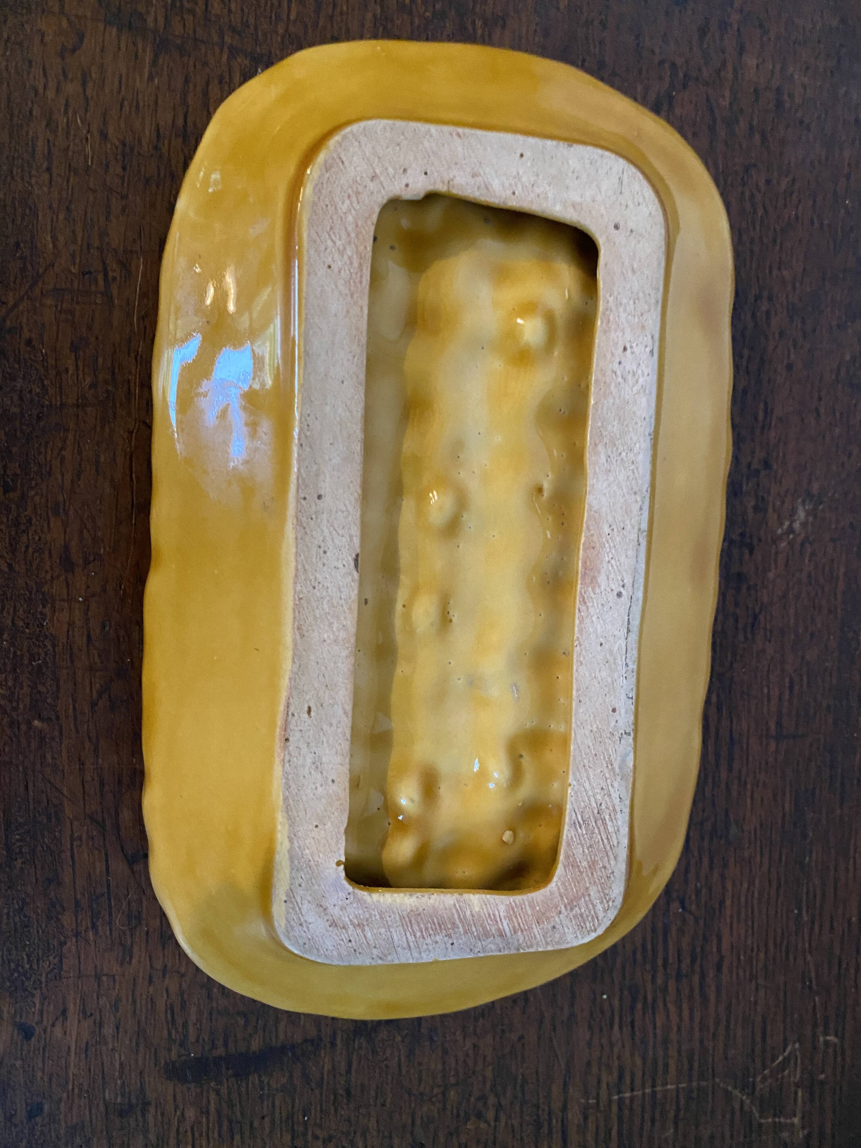 Mustard braided slip pocket emptier