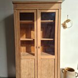 Large antique display cabinet in patinated solid oak.