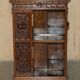 Victorian carved oak revolving library, circa 1880.
