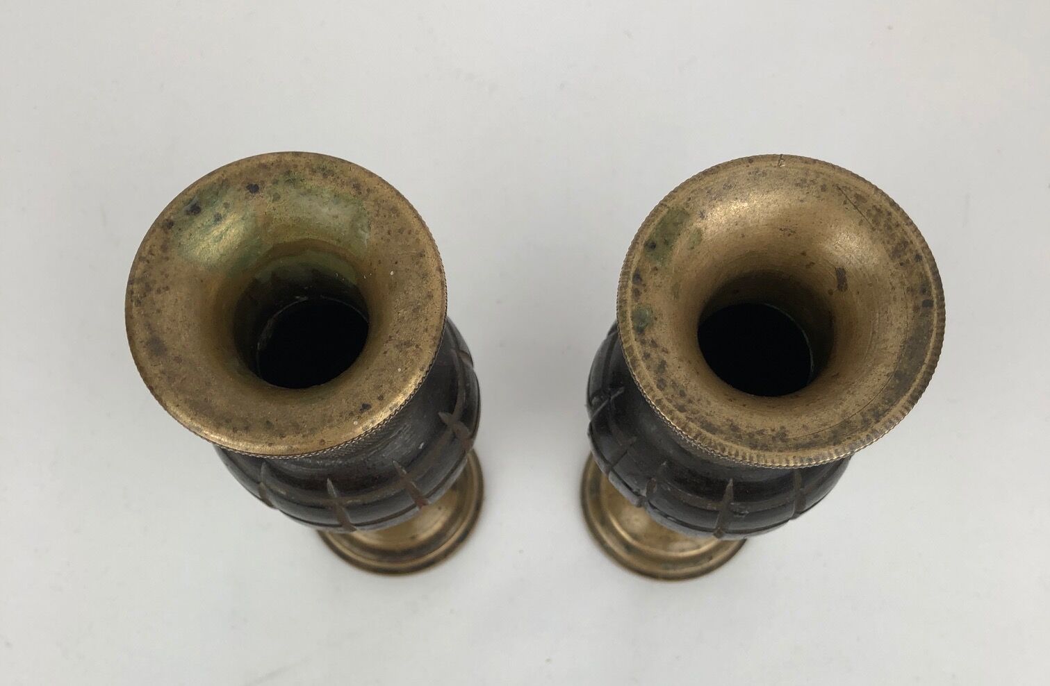 Pair of "Grenade" candlesticks, bronze, 20th