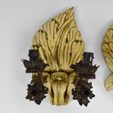 Pair of Hollywood Regency sconces in carved, painted and patinated wood, 1950s