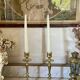 Old pair of turned brass candlesticks