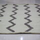 Handmade beige wool carpet 190x125cm