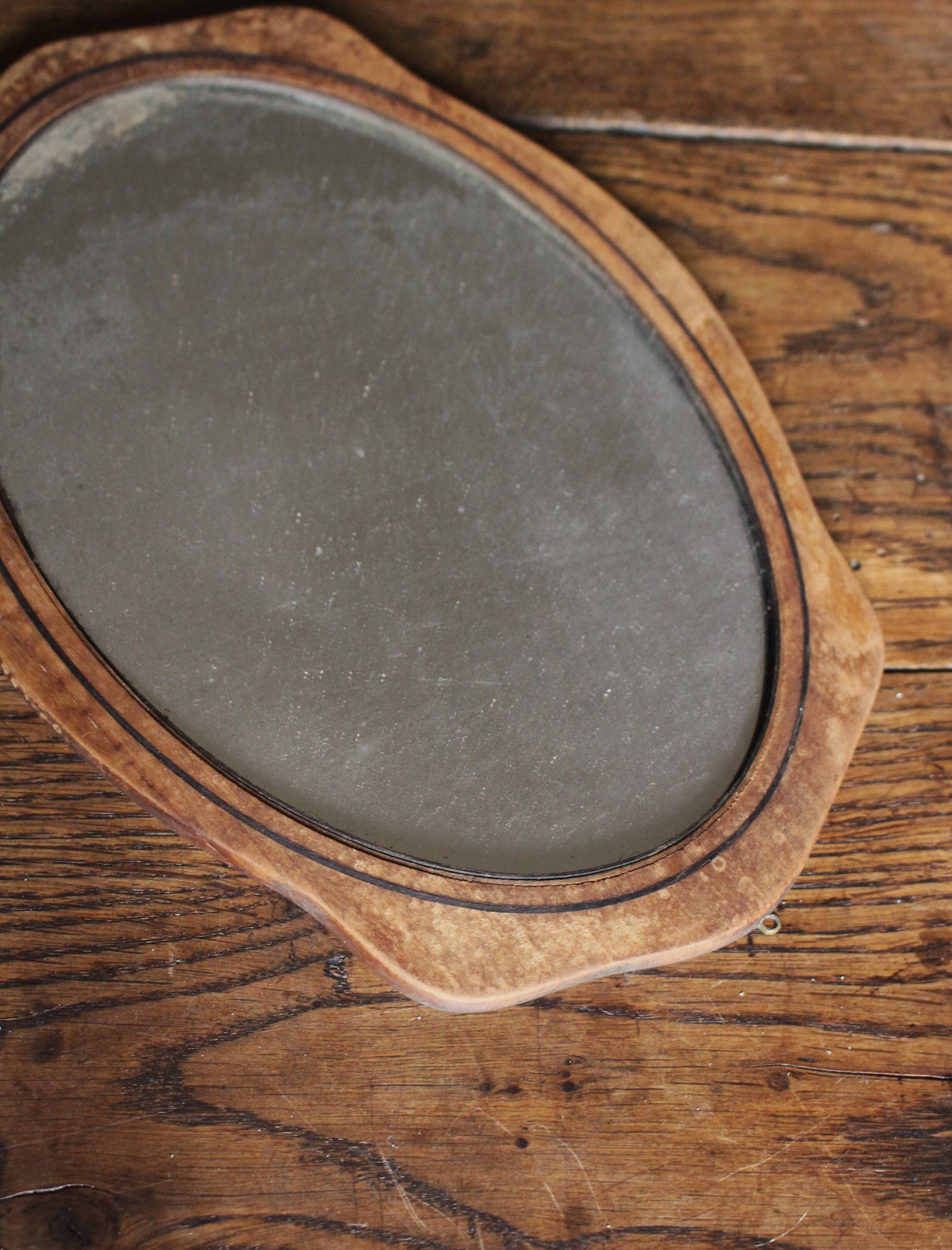 Small old wooden mirror