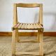 Folding chairs designed by Aldo Jacober in solid beech wood.